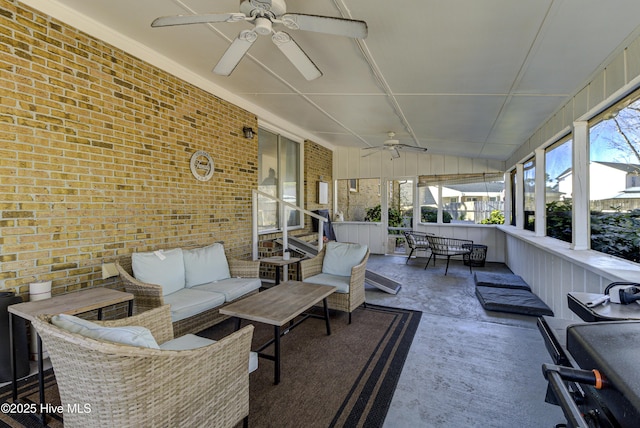 sunroom / solarium with ceiling fan