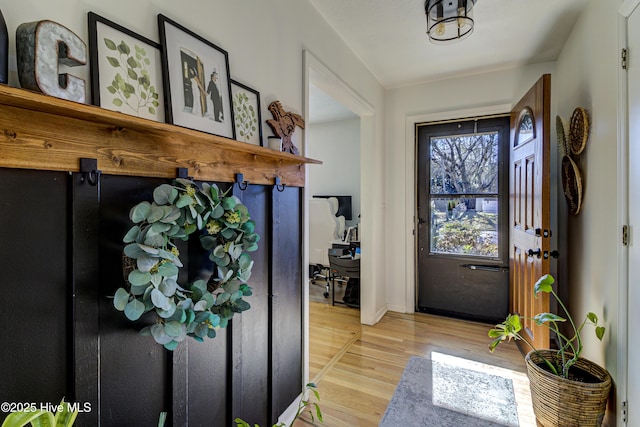 entryway with light hardwood / wood-style flooring