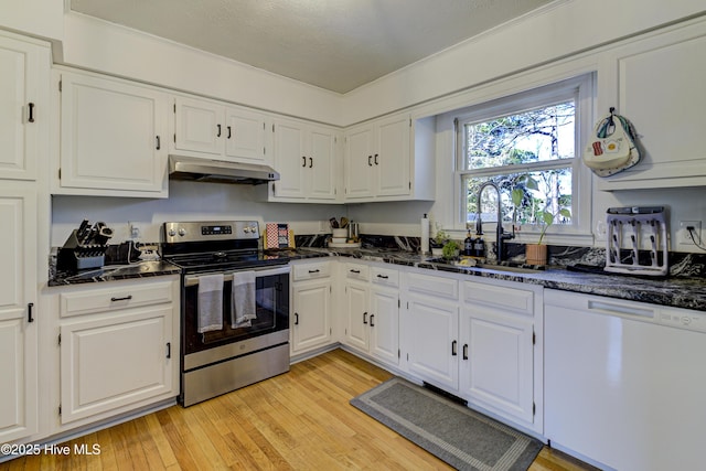 kitchen featuring dishwasher, white cabinets, sink, light hardwood / wood-style flooring, and electric stove