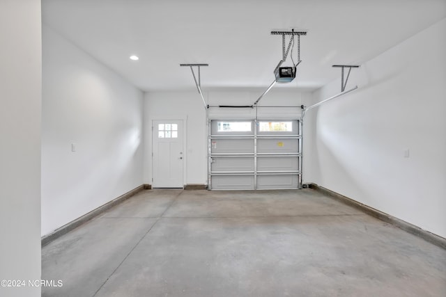 garage featuring a garage door opener