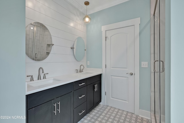 bathroom with tile patterned floors, ornamental molding, a shower with shower door, vanity, and wooden walls