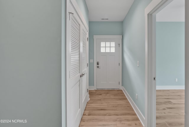 doorway to outside featuring light hardwood / wood-style flooring