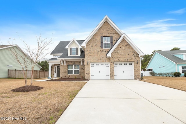 view of front facade featuring a garage and a front yard