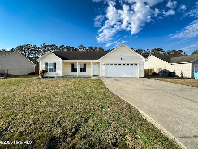 ranch-style house featuring an attached garage, driveway, and a front yard