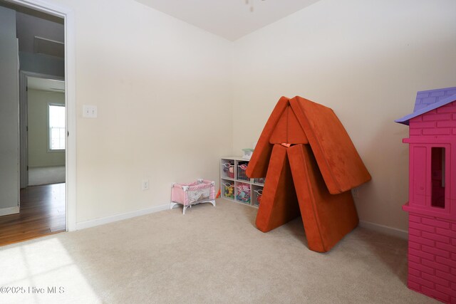 unfurnished bedroom with light colored carpet