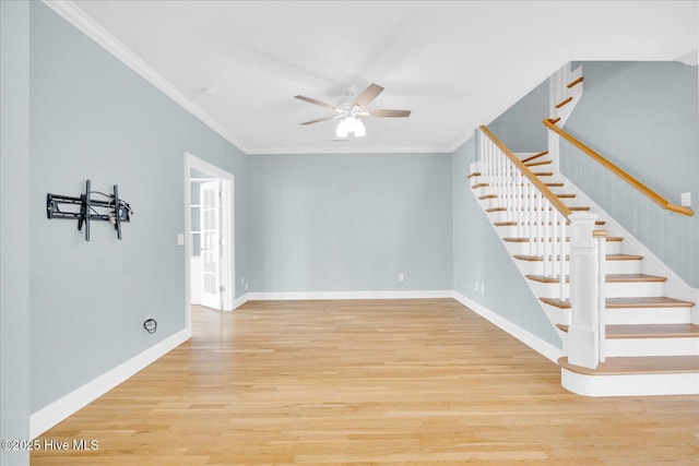 unfurnished room featuring ceiling fan, ornamental molding, and light hardwood / wood-style floors