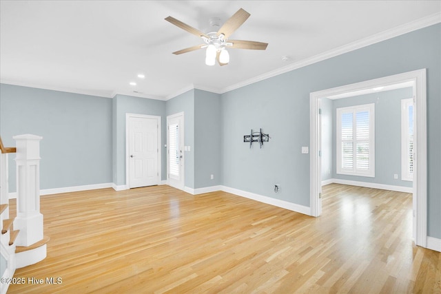 unfurnished living room featuring ceiling fan, light hardwood / wood-style flooring, and crown molding