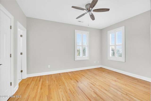 unfurnished room featuring light hardwood / wood-style floors and ceiling fan