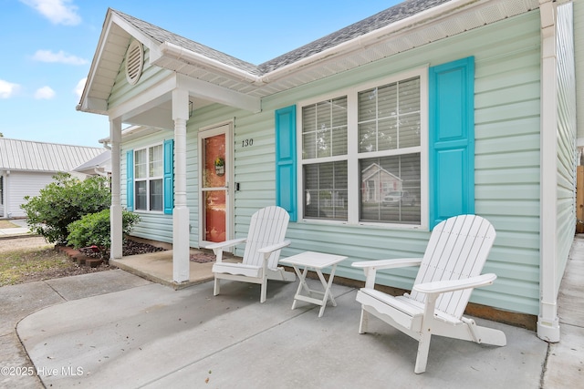 view of patio featuring a porch