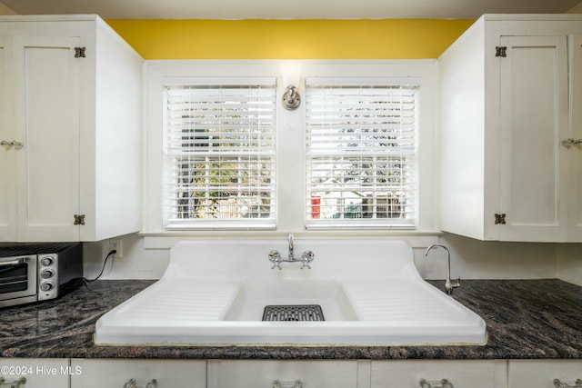 bathroom with sink and a wealth of natural light