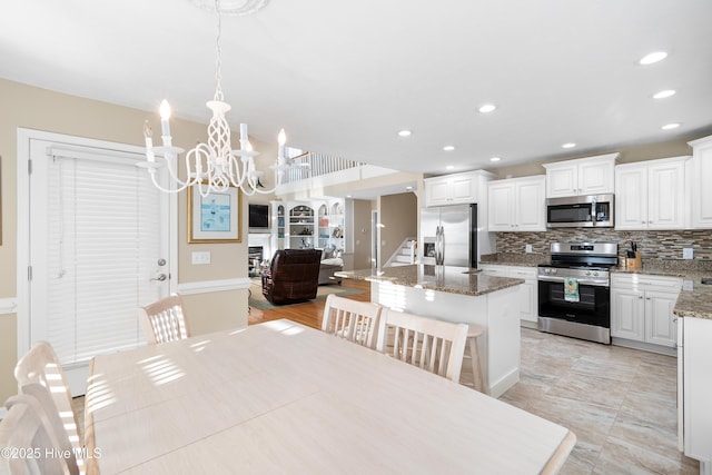 dining room featuring a notable chandelier