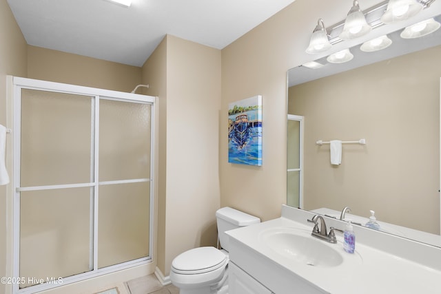 bathroom featuring toilet, an enclosed shower, tile patterned floors, and vanity