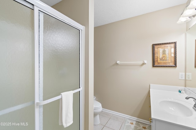 bathroom featuring a shower with door, tile patterned flooring, a textured ceiling, toilet, and vanity