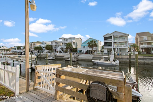 17 Leland St, Ocean Isle Beach, NC 28469 - dock area with a residential view and a water view