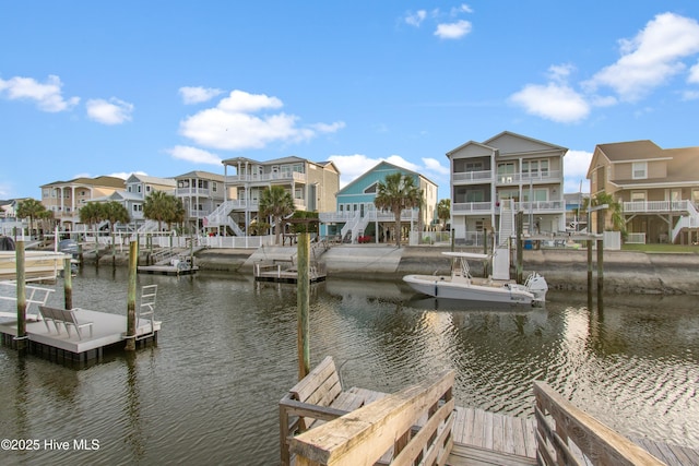 17 Leland St, Ocean Isle Beach, NC 28469 - dock area with a residential view and a water view