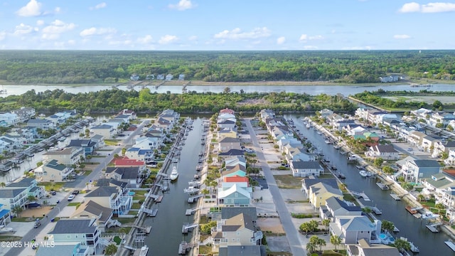 17 Leland St, Ocean Isle Beach, NC 28469 - bird's eye view featuring a forest view, a residential view, and a water view