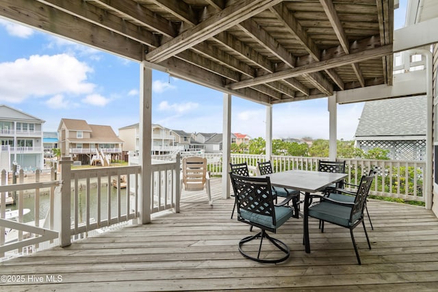 deck featuring a water view