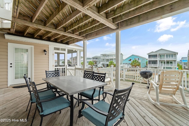 wooden deck with area for grilling