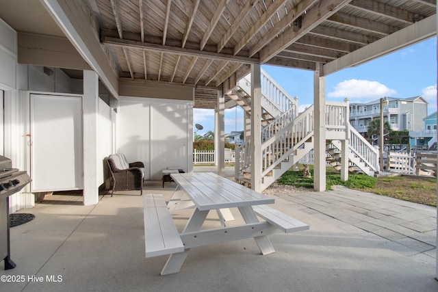 17 Leland St, Ocean Isle Beach, NC 28469 - view of patio featuring stairs