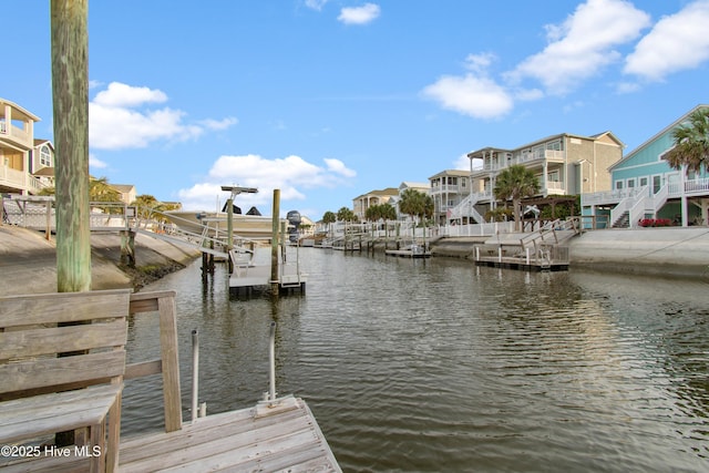 17 Leland St, Ocean Isle Beach, NC 28469 - dock area with a residential view and a water view