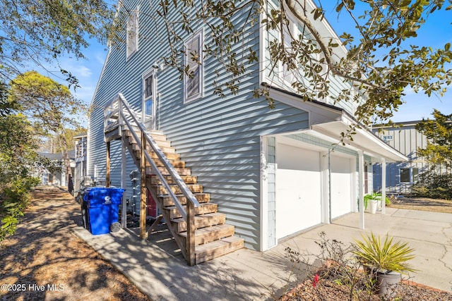 view of property exterior with a garage