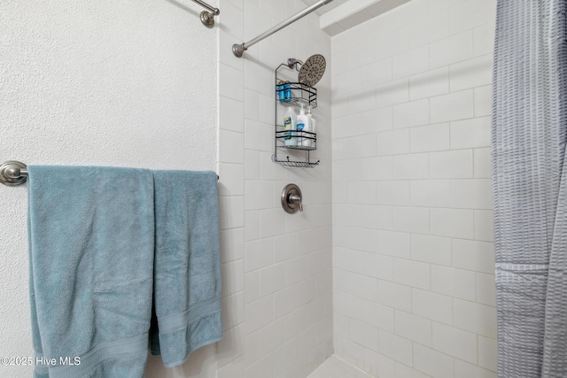 bathroom featuring curtained shower