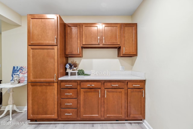 kitchen with light hardwood / wood-style floors