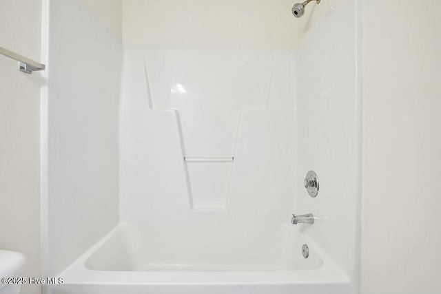 full bathroom with shower / washtub combination