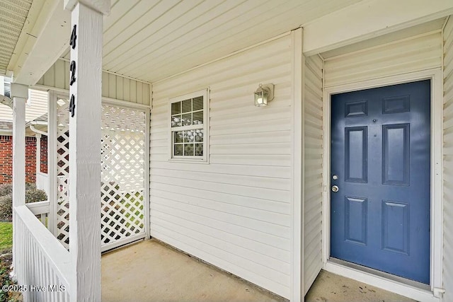 property entrance with a porch