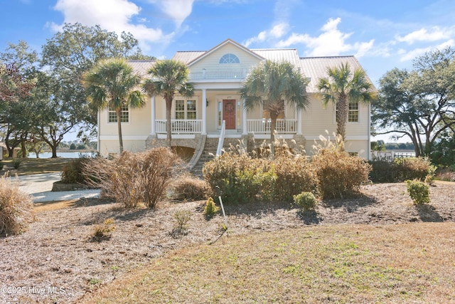 view of front facade with a porch and a front yard