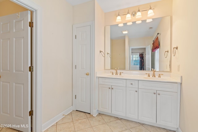 bathroom featuring vanity and tile patterned flooring