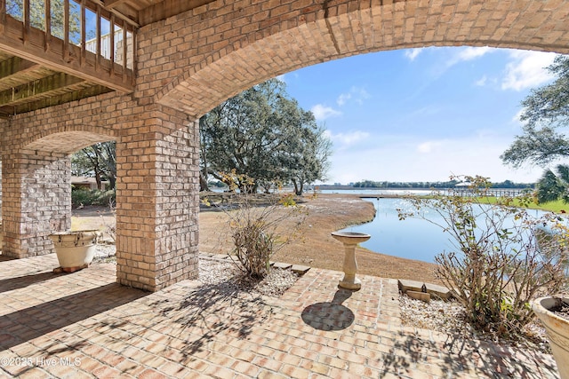 view of patio / terrace with a water view