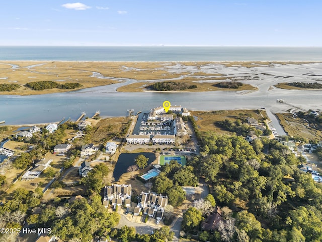 birds eye view of property featuring a water view