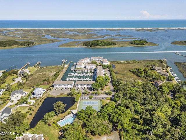 drone / aerial view with a water view