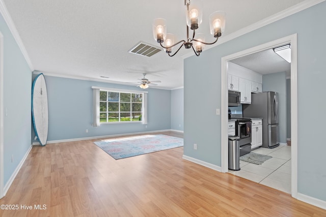 interior space with crown molding, ceiling fan with notable chandelier, light wood-type flooring, and a textured ceiling