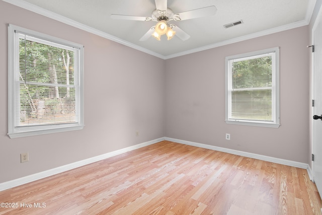 unfurnished room with crown molding, light hardwood / wood-style flooring, and ceiling fan