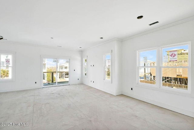 unfurnished room featuring crown molding