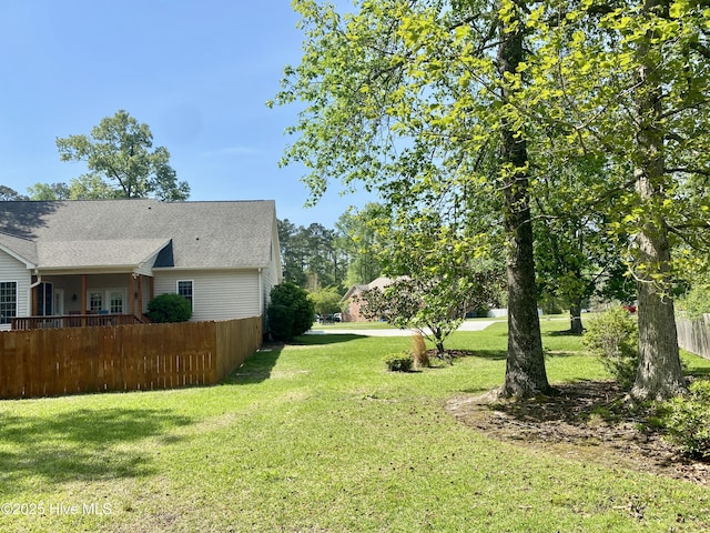 view of yard with fence