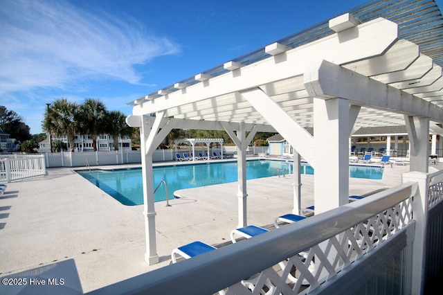 view of swimming pool featuring a pergola and a patio area