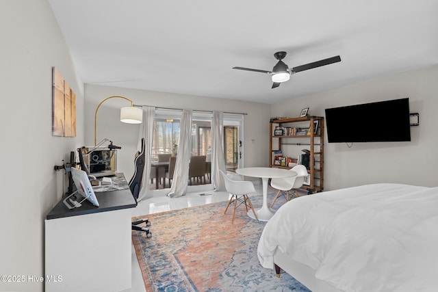 bedroom featuring access to exterior and ceiling fan