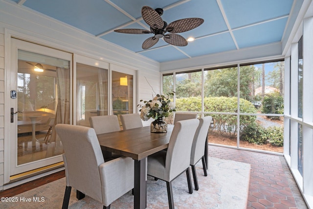 sunroom / solarium with ceiling fan