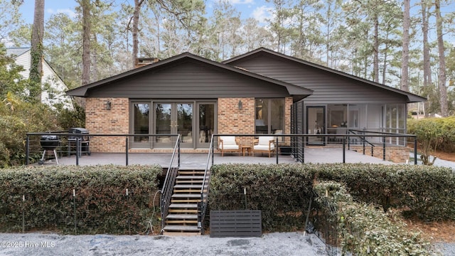 exterior space with outdoor lounge area and a patio area