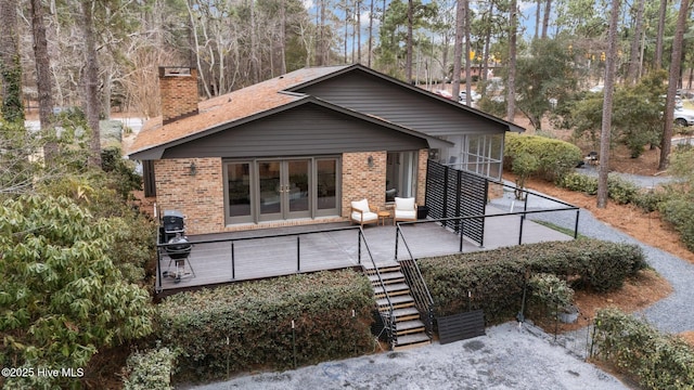 back of house with french doors