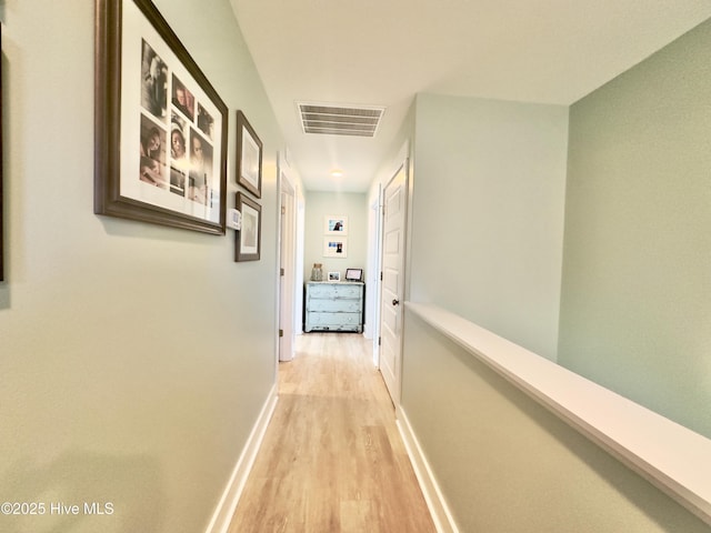 hallway featuring light wood-type flooring