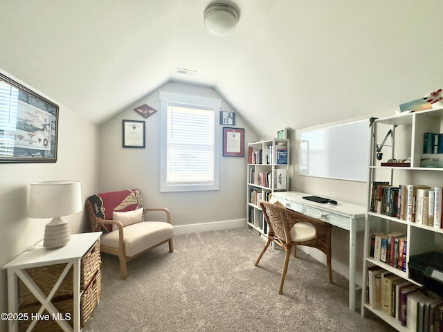 office area featuring vaulted ceiling and carpet