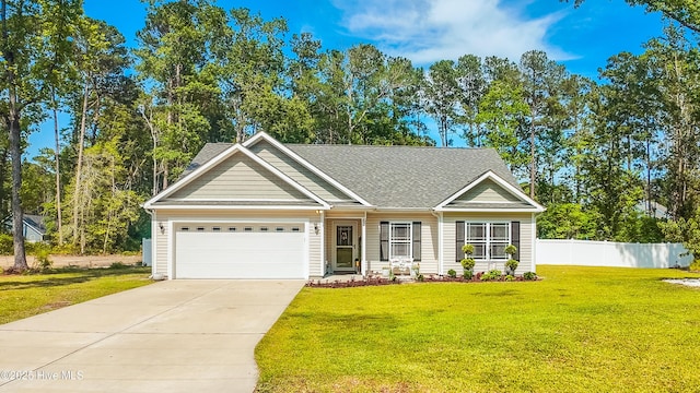 62 NE Dr NW, Calabash, NC 28467 - view of front facade with an attached garage, concrete driveway, and a shingled roof