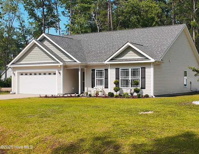 62 NE Dr NW, Calabash, NC 28467 - view of front of property with a shingled roof, an attached garage, a front lawn, and concrete driveway