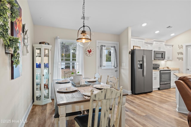 62 NE Dr NW, Calabash, NC 28467 - dining area with baseboards, light wood-style flooring, and recessed lighting