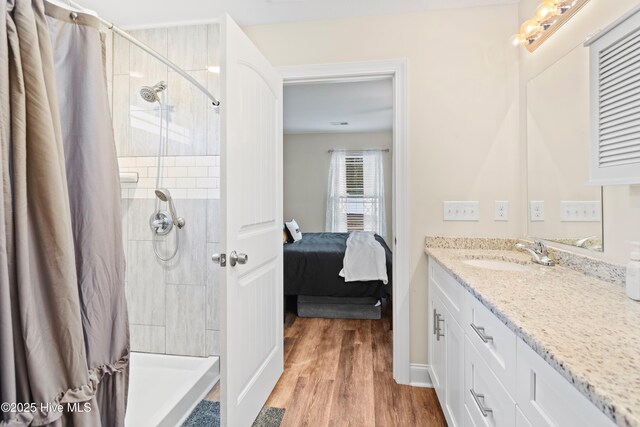 bedroom featuring light hardwood / wood-style floors, a closet, and ceiling fan