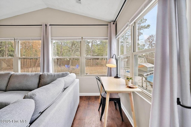 sunroom with lofted ceiling